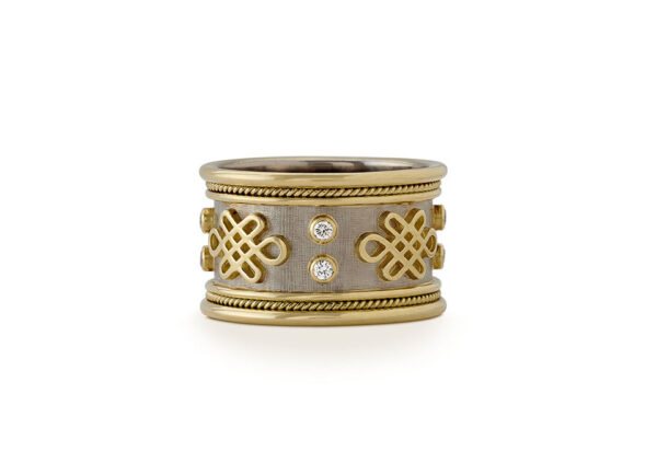 Yellow and white gold Eternal Knot ring with diamonds; fine jewellery London