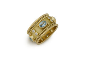 Gold Templar band ring with aquamarines and diamonds