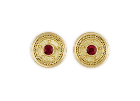 18ct yellow gold stud earrings with 1.10cts faceted rubies, gold bead accents, linen-textured gold, and a wire-twist-wire edge. Post and scroll fittings.