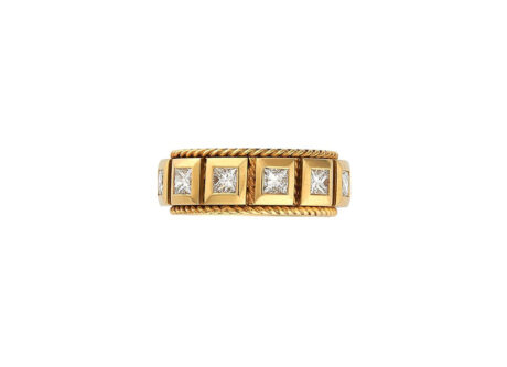 18ct yellow gold eternity ring with twelve princess cut diamonds totaling 1.90 carats.