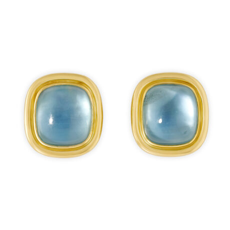 18ct yellow gold earrings with cushion-cut cabochon aquamarines (54.36cts total) set in polished gold surrounds. Clip fittings for secure wear.