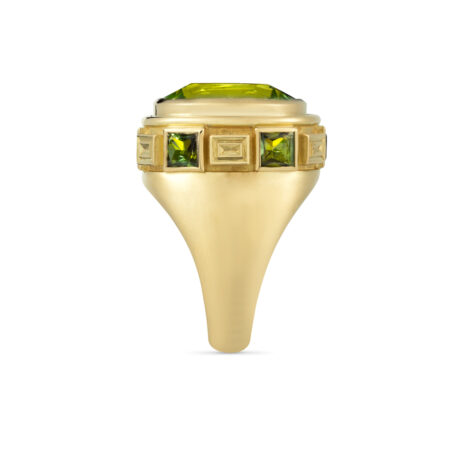 18ct yellow gold Charlemagne ring featuring a cushion-shaped faceted peridot and princess-cut green tourmalines with carved gold plinths by Elizabeth Gage