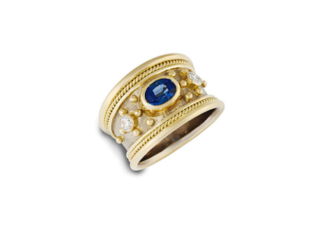18ct yellow and white gold Templar ring with oval Sri Lankan sapphire (0.93cts), round brilliant-cut diamonds (0.21cts), gold bead detail, wire-twist-wire edge, and linen-textured background