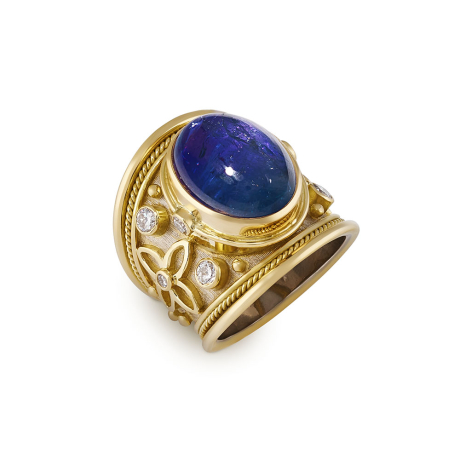 18ct yellow and white gold Templar ring with 13ct cabochon tanzanite, diamonds, and gold bead detail