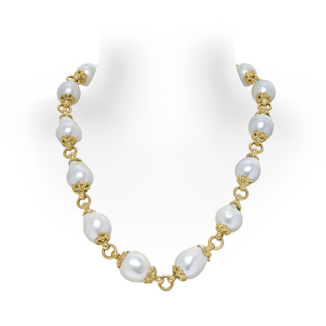 18ct yellow gold necklace with graduated baroque South Sea pearls, molten gold caps, and dragon head clasp.