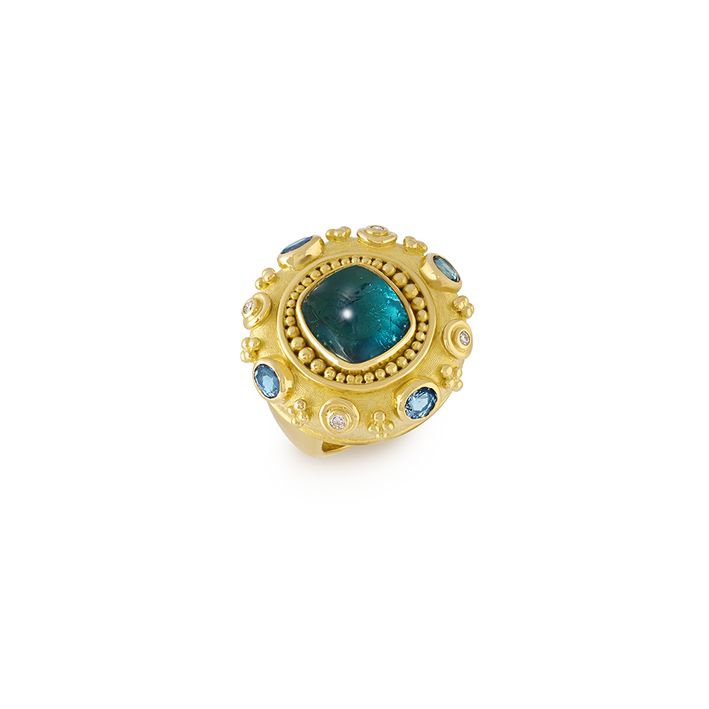18ct yellow gold Ottoman ring with 8.92ct blue-green tourmaline, aquamarines, diamonds, gold bead surround, and linen-textured gallery.