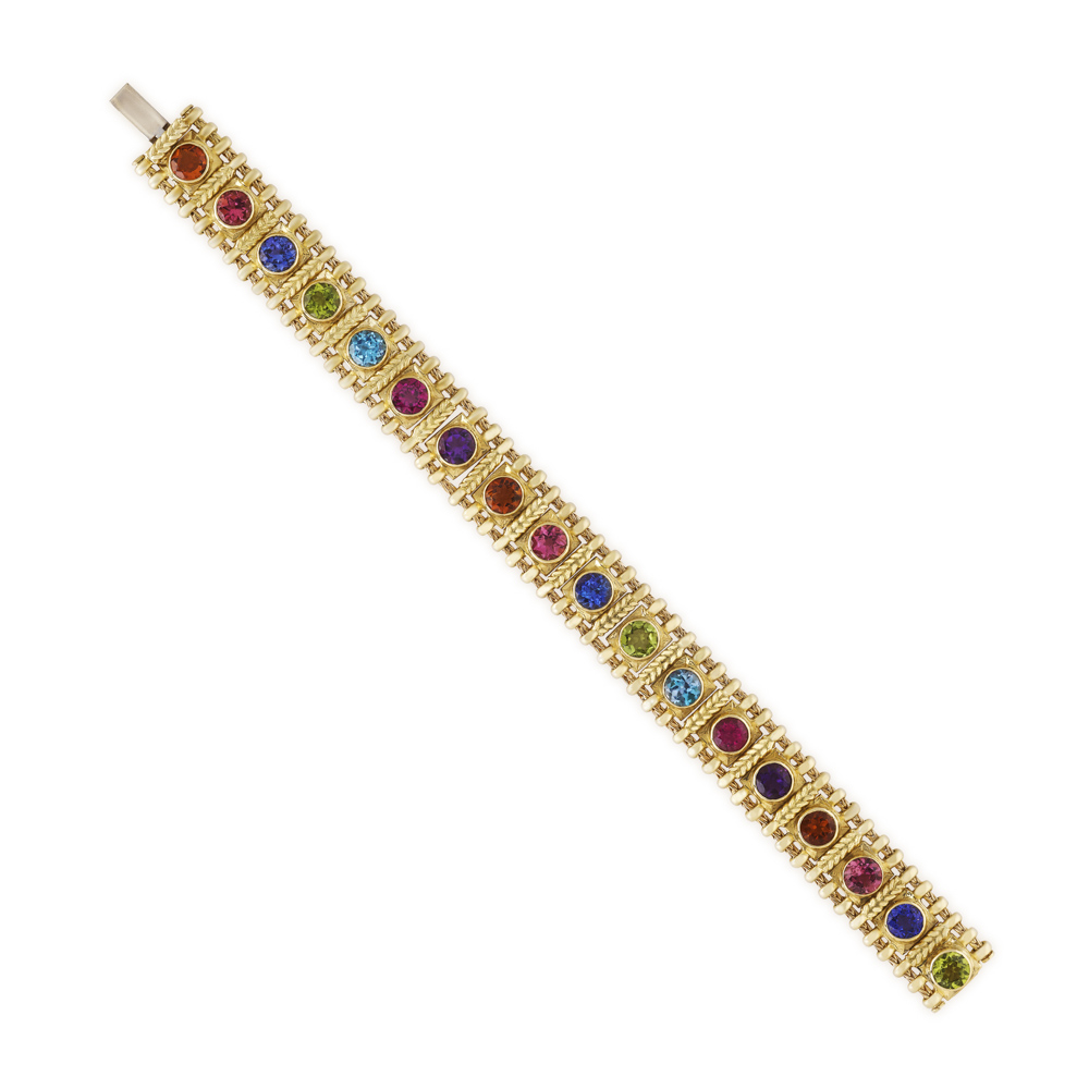 18ct yellow gold Agincourt bracelet set with multi-coloured faceted gemstones including amethyst, peridot, tanzanite, tourmaline and citrine, finished with twist-wire gold sections and flexible foxtail chain.