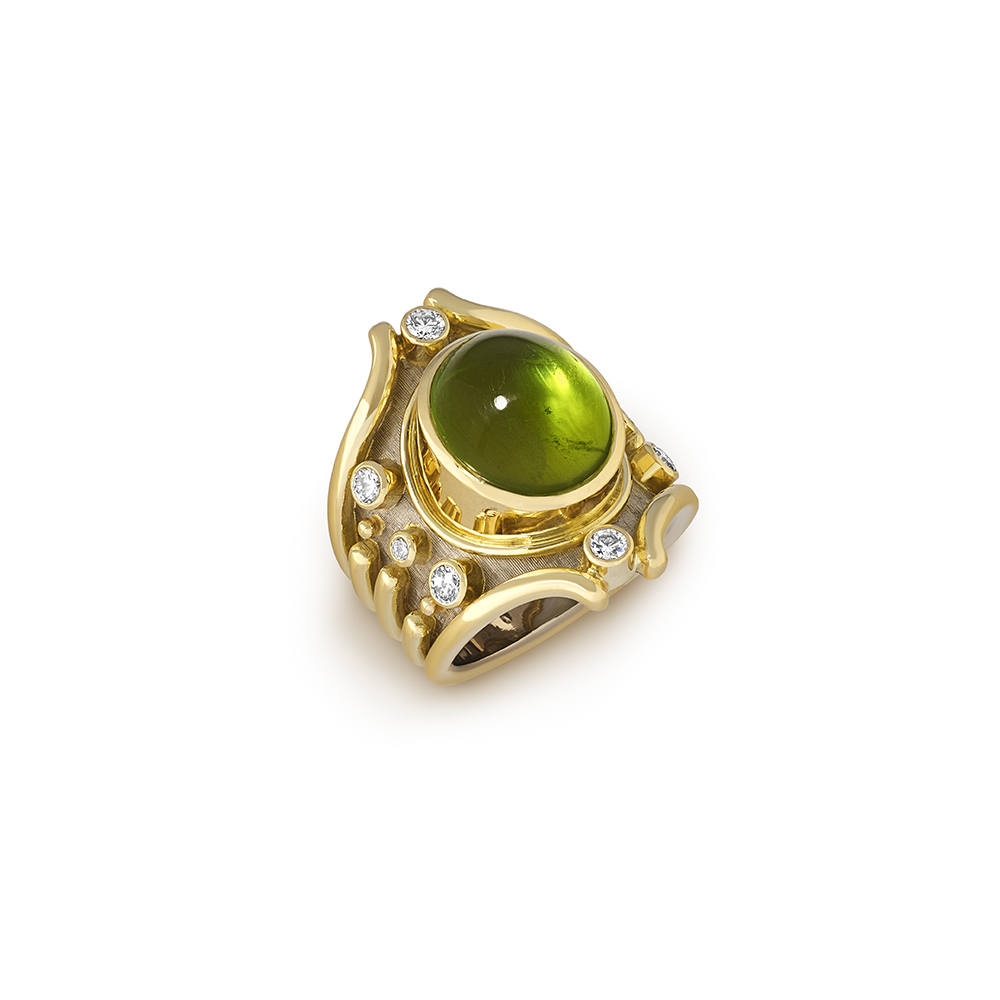 18ct yellow and white gold Heliotrope ring with 24.35ct cabochon peridot, diamond accents, decorative wirework, and gold bead detail.